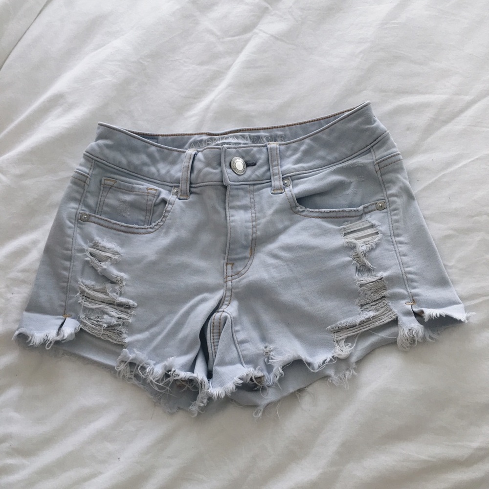 American Eagle distressed light wash shorts